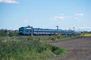 245 201 - 2025-08-18-085 Emmelsbüll Lehnshallig 245 201 mit einer Doppelgarnitur als RE 6 nach Westerland.