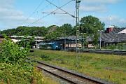 526 002 - 2025-08-16-006 Flensburg 526 002 hat Flensburg erreicht und fährt zurück bis Schleibrücke. ZUm Aufladen des Akku´s ist der Stromabnehmer am Fahrdraht.